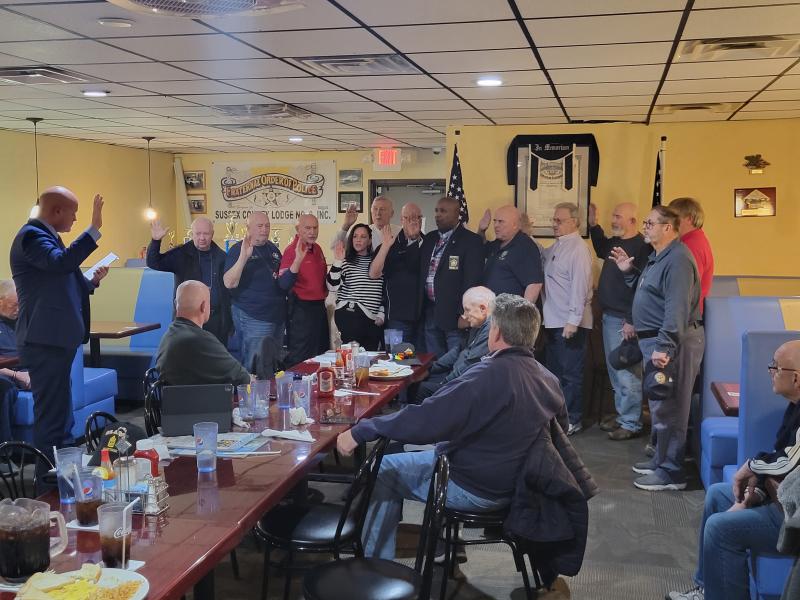 Gathered for the installation ceremony are (l-r) Fraternal Order of Police Delaware State Lodge President Jamie Leonard; Lodge 2 officers Treasurer Jerry Gibson, trustee Vic Guempel, Secretary Stephen H. Smyk, 2nd Vice President Denise Weston, Chaplain Albert Weir, First Vice President Greg Bennett, President Greg Fuller, Past President Bob Schappert, and trustees Steve Smith and Dave Jacobs; state lodge trustee Sherman Littleton; and Lodge 2 trustee Mike Pantazes. SUBMITTED PHOTO